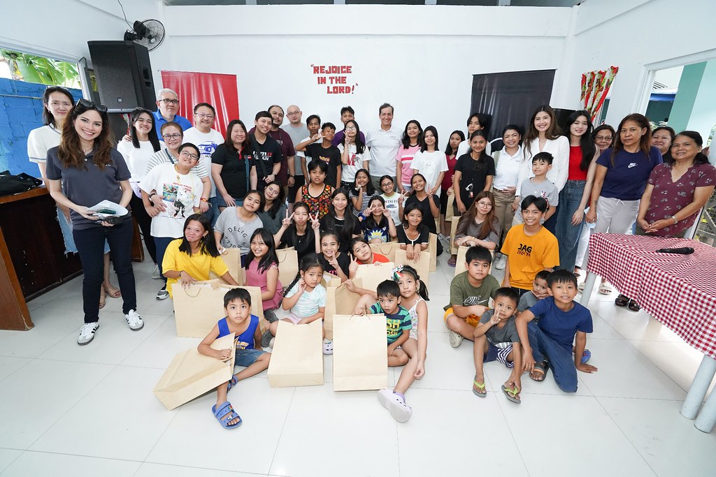 Nissan Philippines turn over pairs of shoes to the children of Duyan ni Maria with Kicks Club founding members