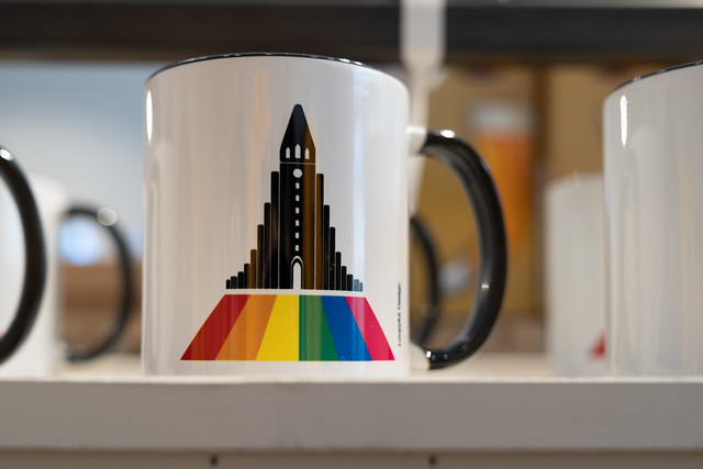 Reykjavik, Iceland - July 10, 2023: Colorful coffee mug featuring the Rainbow Road and Hallgrimskirkja church for sale in a gift shop
