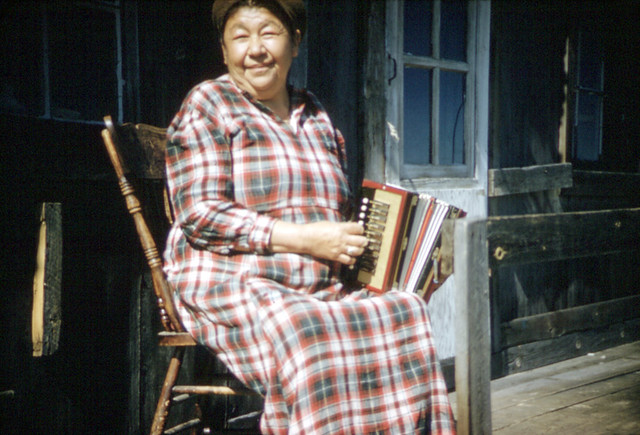 Jessie Mann playing the accordion at her home in Gogama, Ontario