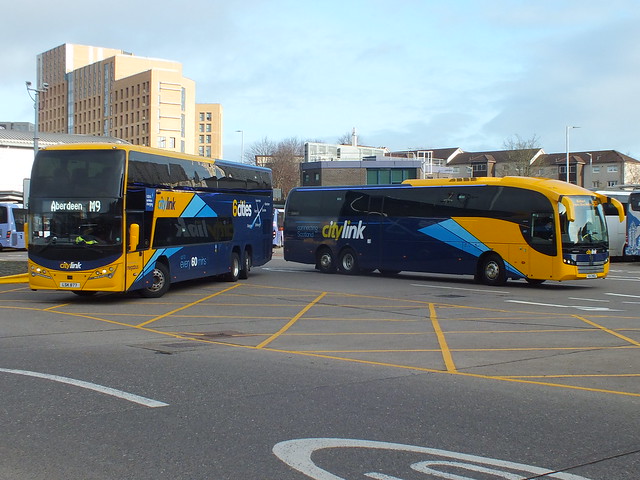 LSK877 Parks Plaxton Panorama stands with Ulsterbus Sunsundegui XUI2902 at Buchanan Street Bus station