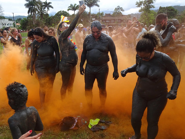 Revelers Amid Orange Smoke, Bloco da Lama (Mud Carnival Party), Jabaquara Beach, Paraty, Brazil