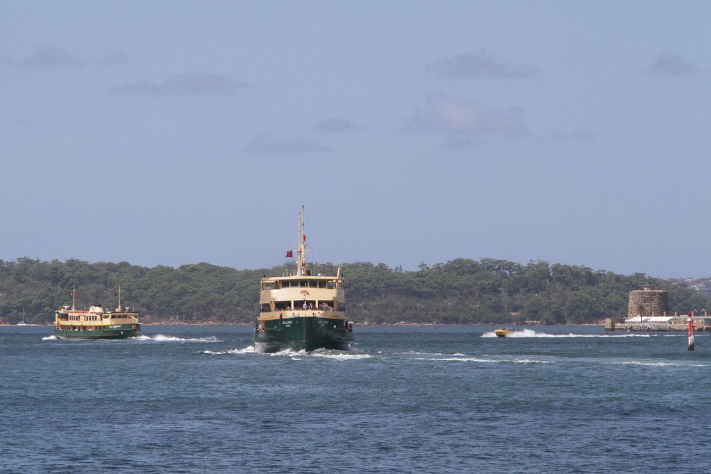 Manly ferry 'Collaroy' passes 'Lady Northcott' off Circular Quay