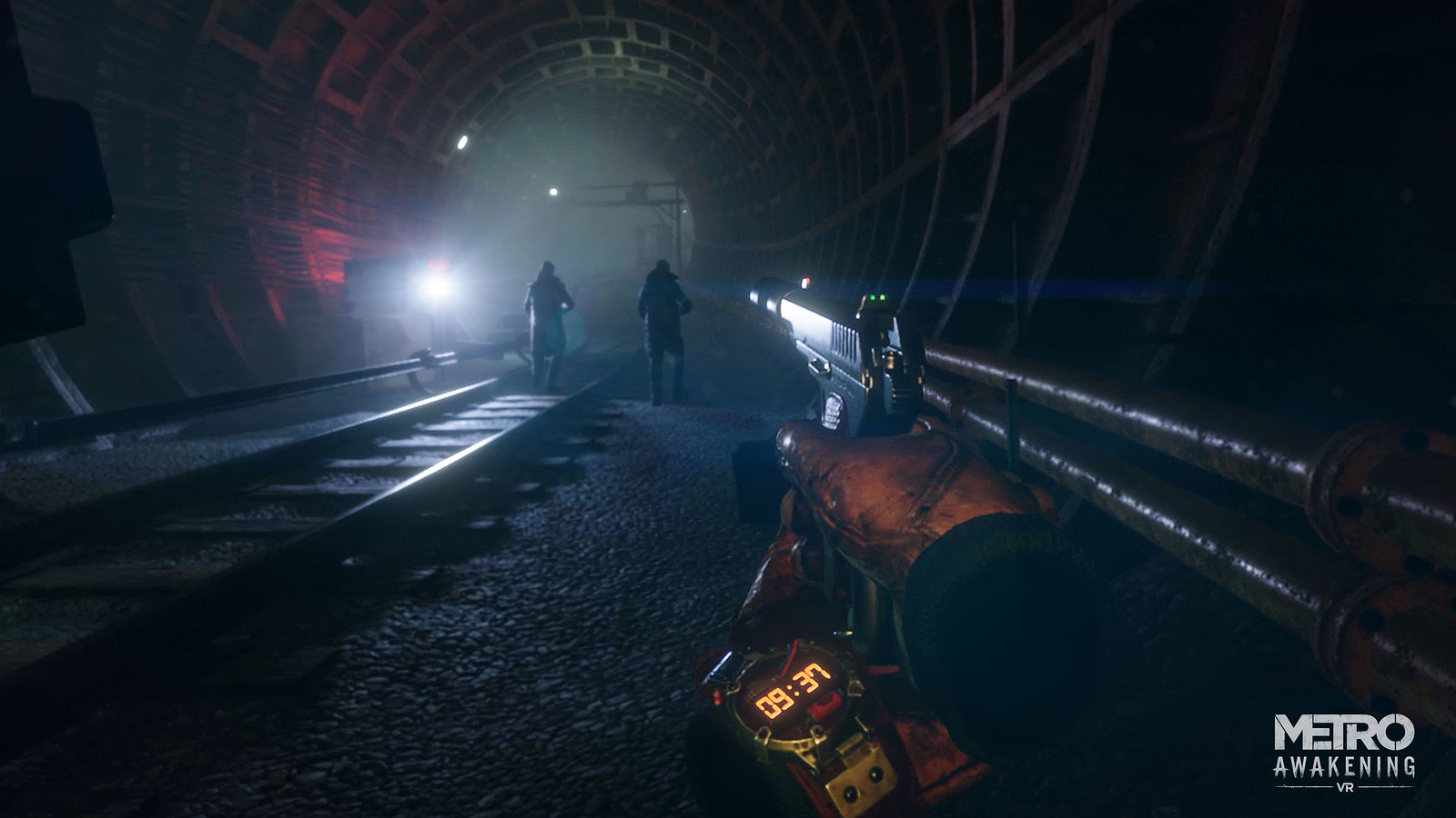 A dark tunnel stretches into the far distance. Two figures are patrolling along the train tracks in front of the viewer, oblivious to the player crouched in the shadows behind them, one hand bracing the other as they aim a pistol at the retreating patrol’s backs. The player’s hands are gloved, and on wrist of one arm is a timepiece, with a glowing digital face stating 09:37.