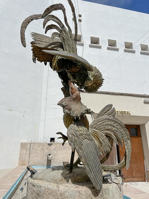 Statues of a rooster fight.