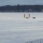 Ice fishing on Houghton Lake, Michigan People fishing through the ice on the East Bay of Houghton Lake, Michigan.

February 2019