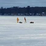 Ice fishing on Houghton Lake, Michigan People fishing through the ice on the East Bay of Houghton Lake, Michigan.

February 2019