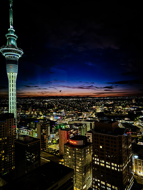 Auckland Sky Tower and CBD at Twilight viewed from hotel room - Auckland New Zealand
