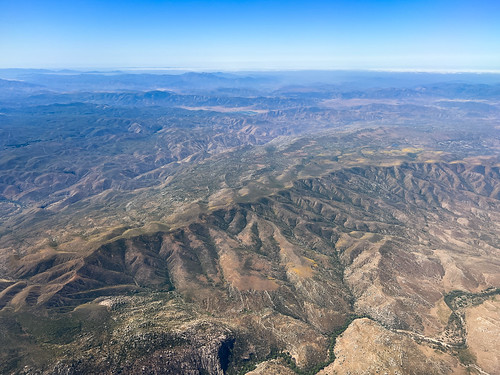 Flying over the hills of Baja California On the way to Tijuana
