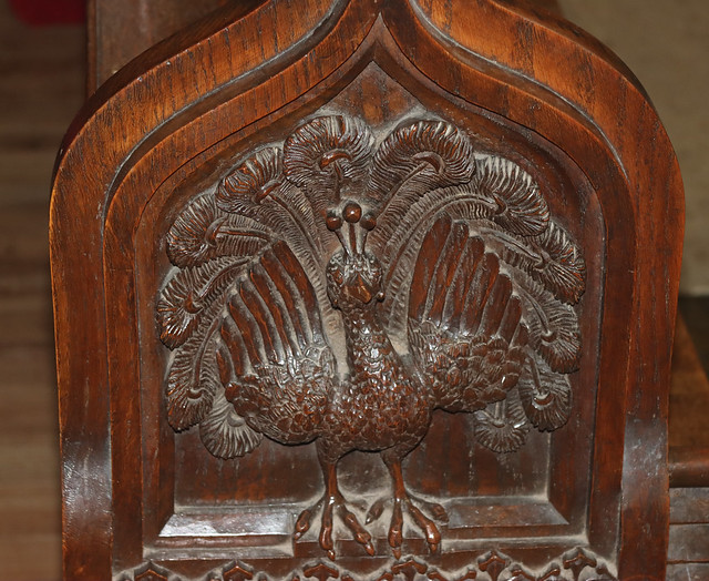 Peacock pew end