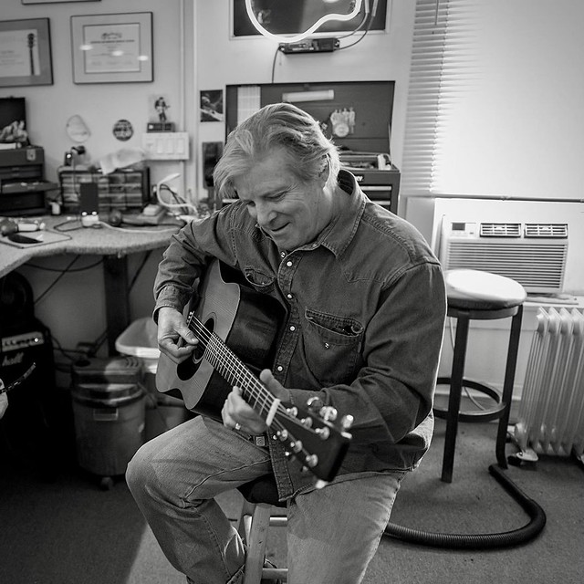 I really like this black and white pic of Keith Skelton in the shop yesterday picking up his Martin after corrections.