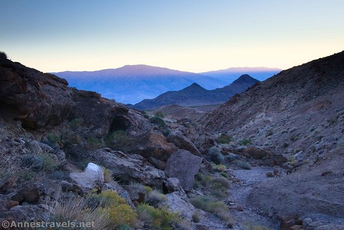 The Death Valley Buttes and sunset on the Panamint Mountains from Hole in the Rock Spring, Death Valley National Park, California