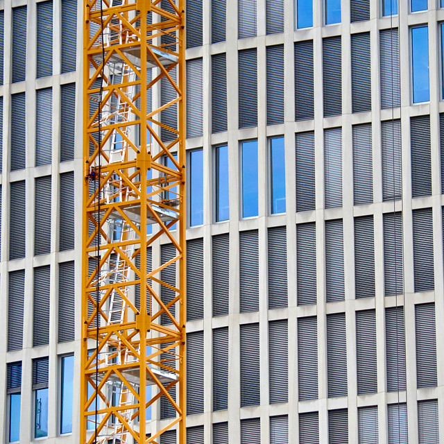 Yellow crane, blue windows