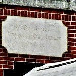 January 15, 2023: German-language plaque on front of St. John's Lutheran Church, Lancaster, New York This stone panel affixed on the front exterior wall of St. John&#039;s Lutheran Church in Lancaster, New York, just above the entrance, is engraved in German with the church&#039;s original name - &lt;i&gt;Erste Deutsche Evangelische Luth. Gemeinde&lt;/i&gt; (First German Evangelical Lutheran Community) - and the year 1874, in which the construction of the present church building, the second to house the congregation, was begun.