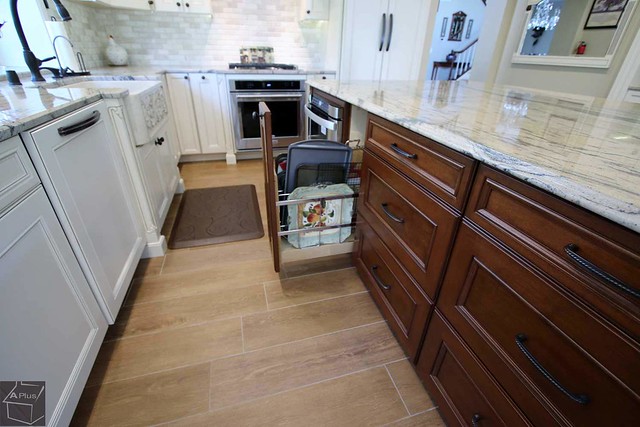 traditional complete kitchen remodel with custom white cabinets, granite counter tops, farmhouse sink & wood floor in the city of Irvine, Orange County https://www.aplushomeimprovements.com/portfolio_page/131-irvine-kitchen-remodel/