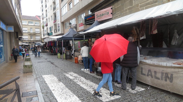 Red  umbrella, street  market,  Calle  Norte,  Carballiño,  Ourense, Galicia,  Spain