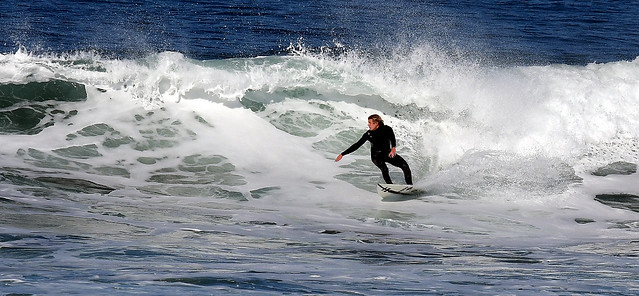 Surfer at Morro Rock Beach