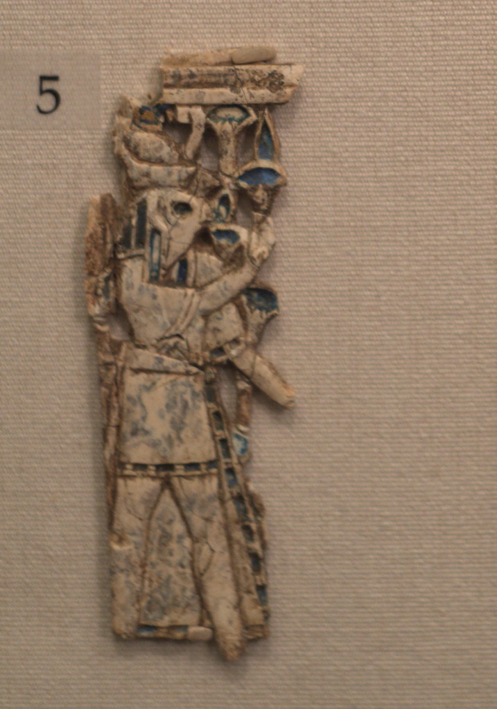 Ivory plaque with falcon-headed figure wearing Egyptian double crown, from Nimrud