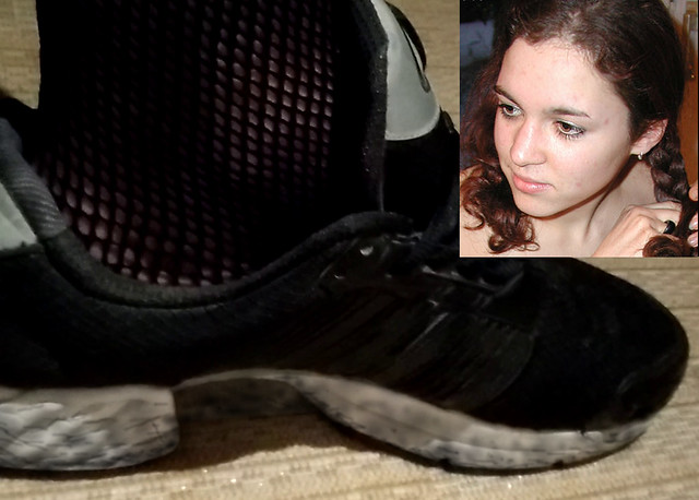 Beautiful Girl with beautiful fishnets in worn out Adidas Climacool CC1