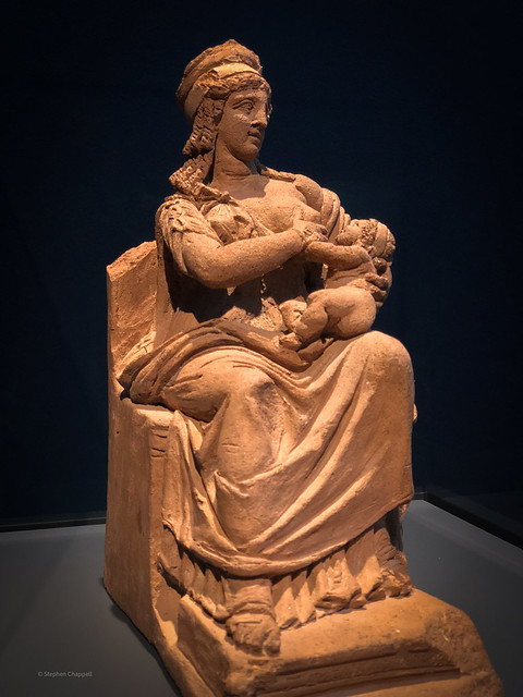Roman terracotta figurine of the goddess Isis nursing her son Harpokrates