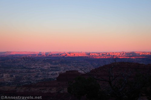 Sunset over the Needles from the Black Rim of the Waterhole Flat Road, Glen Canyon National Recreation Area en route to the Maze District of Canyonlands National Park, Utah