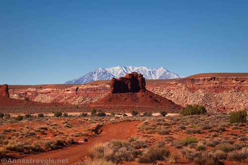 A rock formation and the Henry Mountains from the Waterhole Flat Road, Glen Canyon National Recreation Area en route to the Maze District of Canyonlands National Park, Utah