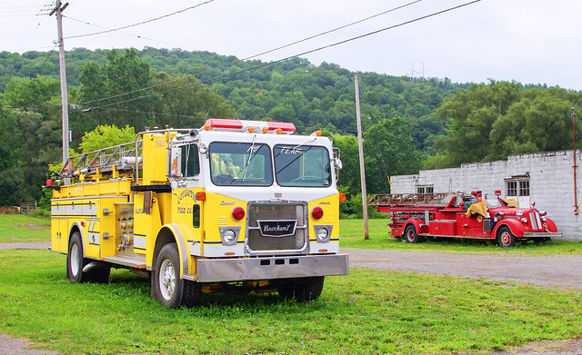 Two Generations of Fire Trucks