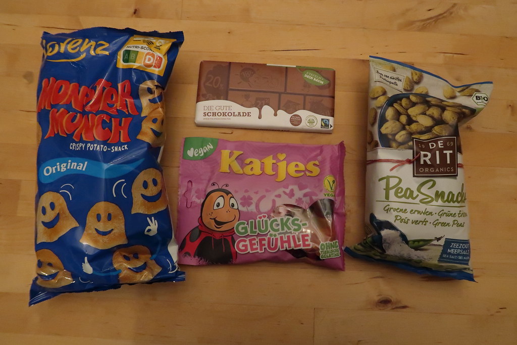 Monster Munch Kartoffel Snack, „Die gute Schokolade“, Katja Glücksgefühle und Pea Snack