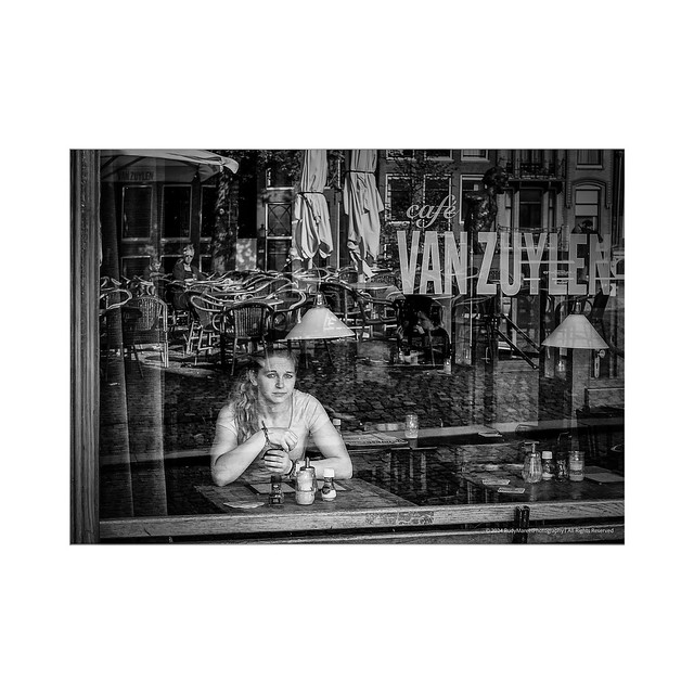 Urban Solitude: An Amsterdam Cafe Scene