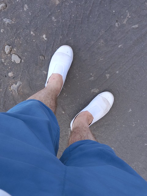 White Rucanor slip-on plimsolls from new and clean to dirty and trashed soles in a few days
