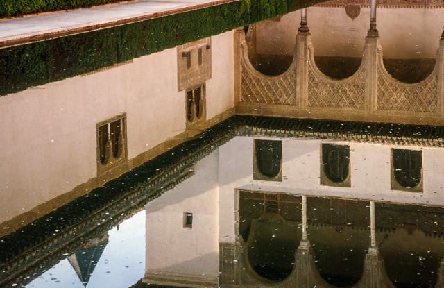 Reflections in pool of Court of Myrtles 2001, film, Alhambra, Granada, Spain