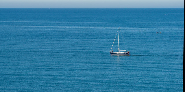 Boats on a Calm Sea Heading to the Port at Vilamoura - Portugal