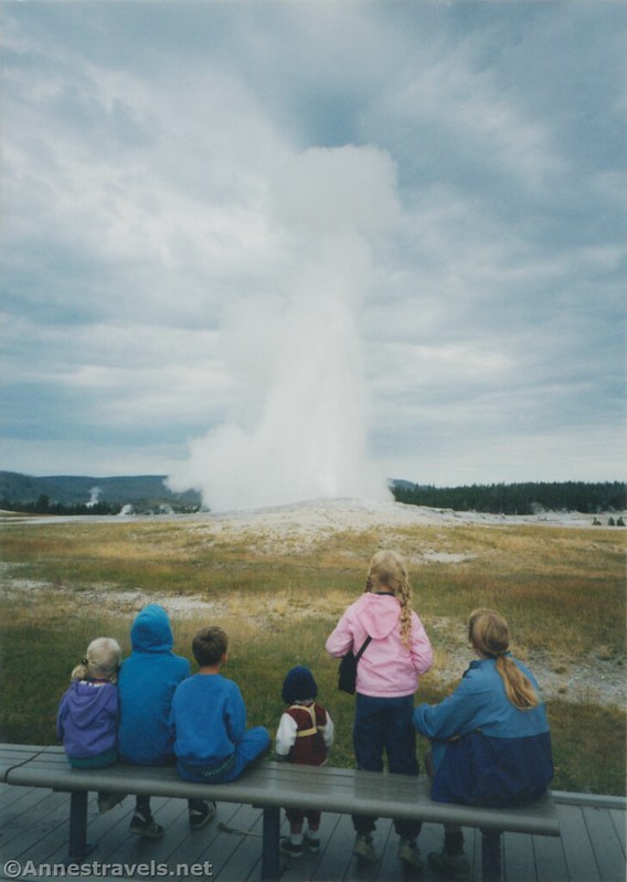 Watching Old Faithful go off in 1999.  My mom had been braiding my hair, which is why it looks funny.  Yellowstone National Park, Wyoming