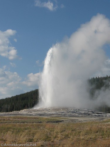 Old Faithful in 2019.  We were standing beside Beehive Geyser, so this is the "back side" of the geyser. Yellowstone National Park, Wyoming