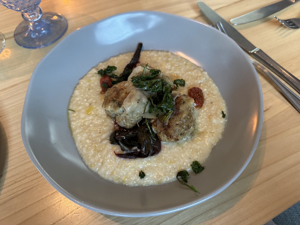 Heritage turkey meatballs with grits and greens