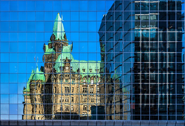 Confederation Building reflection on the Bank of Canada Building