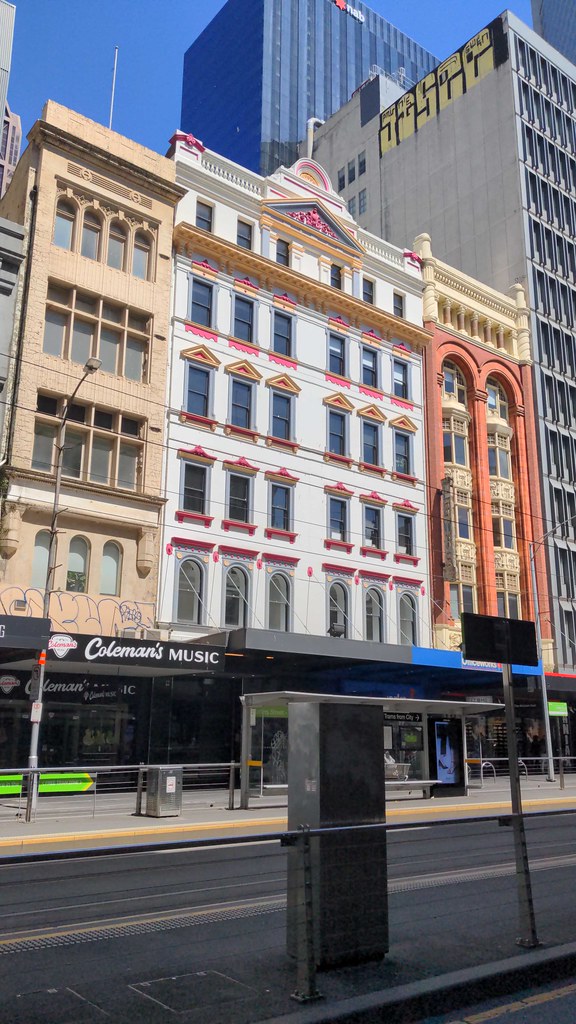 Newly repainted heritage building in bright colours at 107 Elizabeth Street, Melbourne