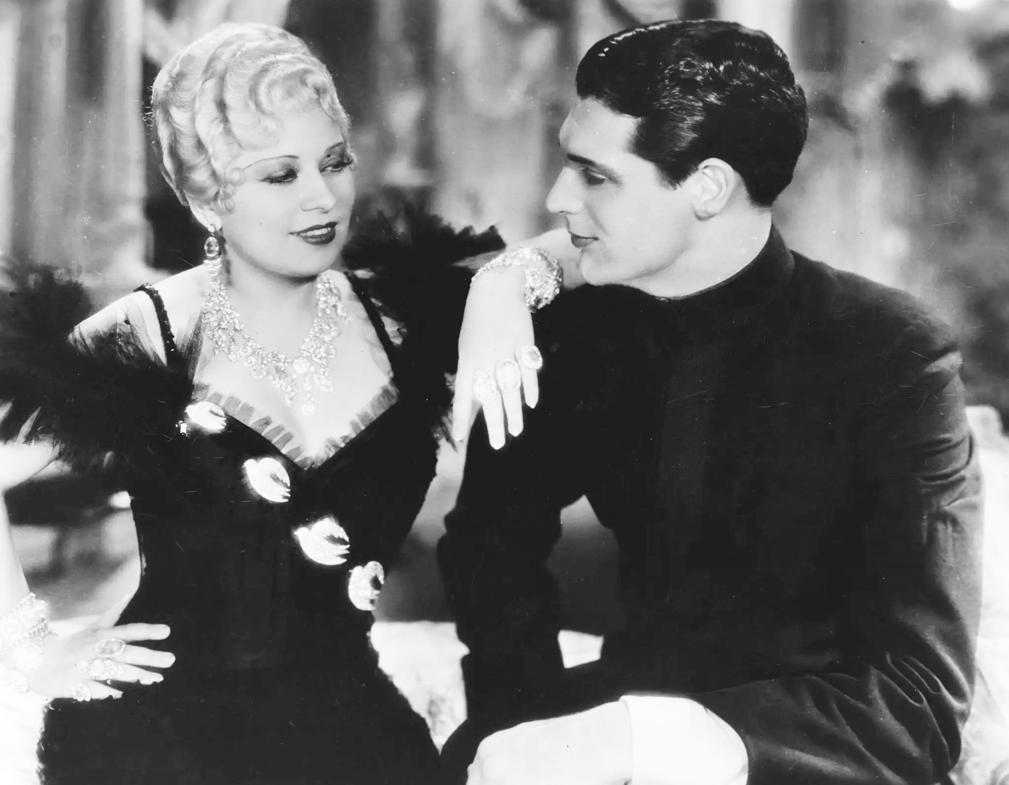 Saloon-keeper Mae West (1892 - 1980) falls for investigator Cary Grant (1904 - 1986) in the Paramount production 'She Done Him Wrong', written by West herself and directed by Lowell Sherman. 1933