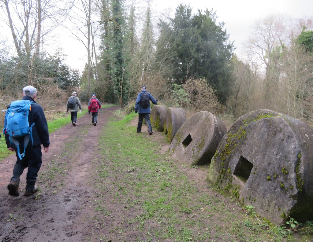 UK - Surrey - Near Chilworth - Walking past giant mill stones in Chilworth Gunpowder Mills