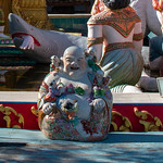Stockton Cambodian Buddhist Temple/ “jolly” (# 2585) At the Stockton Cambodian Buddhist Temple (Wat Dhammararam), this is in front of the fountain where Buddha goes from experiencing distress to experiencing calmness / enlightenment. There is no explanation of this small statue, but it seems to represent a jolly diety, thus my name...

Use the &lt;i&gt;Cambodian Buddhist Temple&lt;/i&gt; tag to see other pictures of the temple.