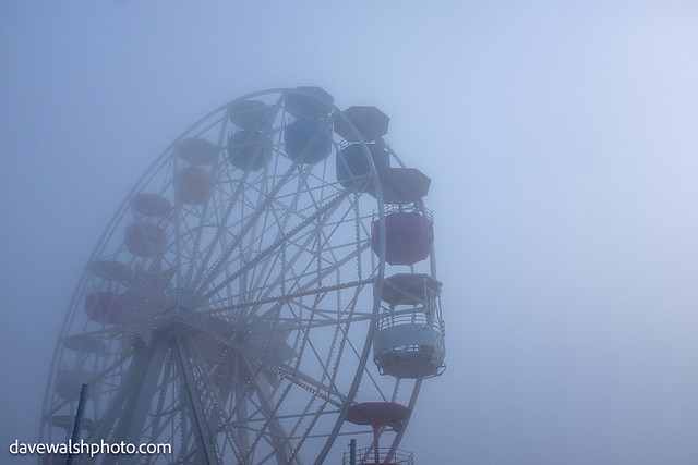 Ferris wheel in fog, Tibidabo, Barcelona, Spain