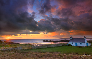 Tyn Tywyn, Porth Nobla, Ynys Môn/Anglesey, Wales at sunset.