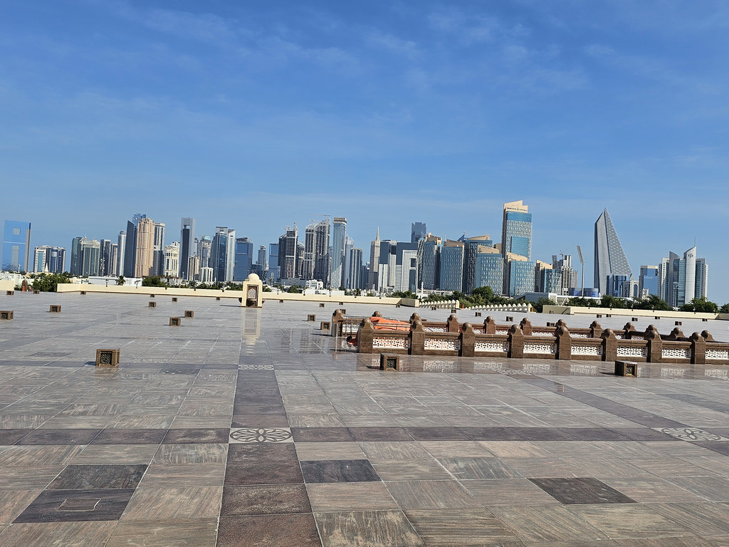 Qatar road sign with Doha skyline