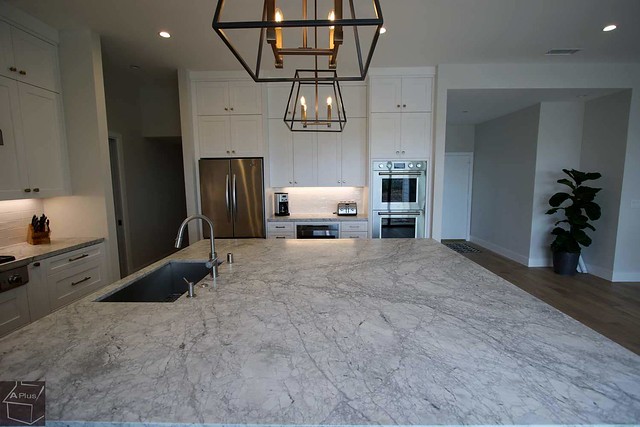Home Remodel kitchen remodeling with custom white kitchen cabinets & dark Island in the city of Laguna Niguel, Orange County https://www.aplushomeimprovements.com/portfolio_page/130-laguna-niguel-kitchen-and-home-remodel/