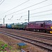 A Class 37 West Coast railways hauling Class 31018, D200 and Coronation LMS coach at Shipton