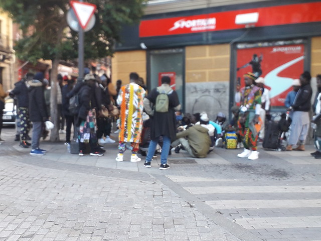 Members  of  the African  community  playing  and  listening  to  music   in   Plaza  de Lavapies,  Lavapies, Madrid