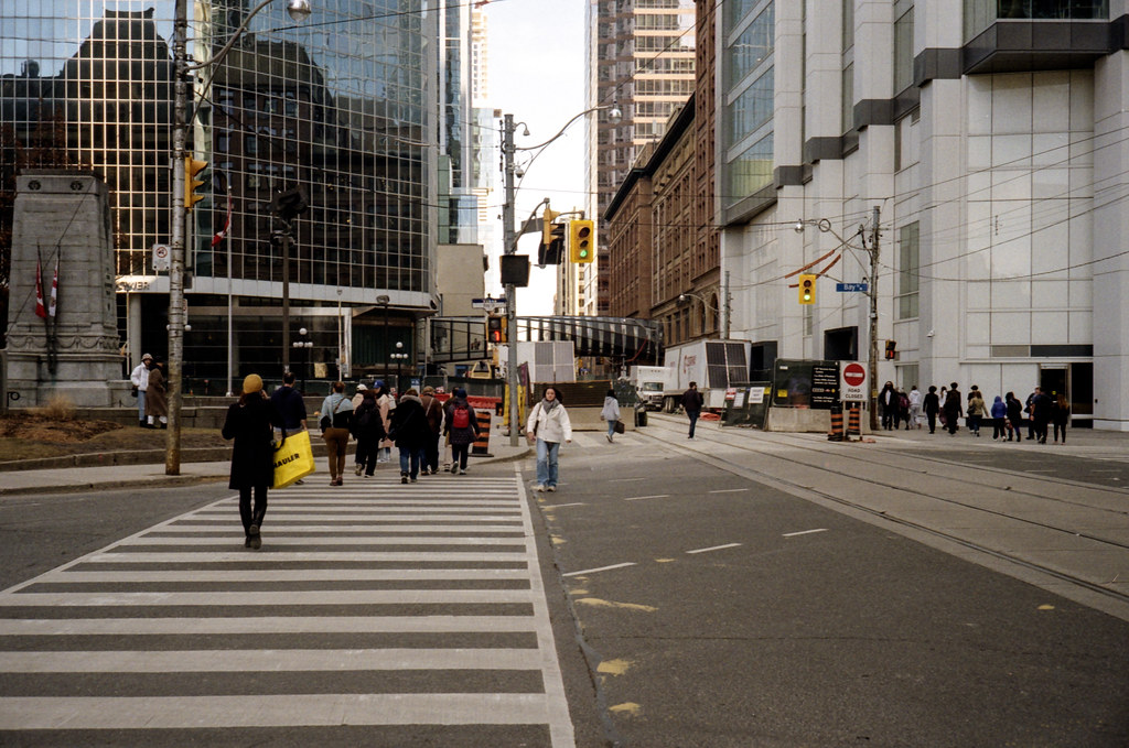 Crossing Bay St. at Queen St