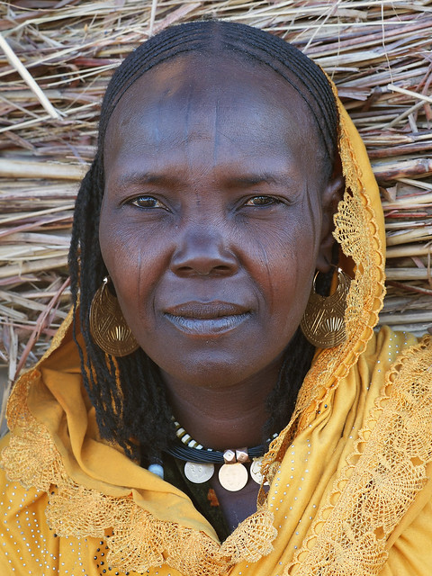 Beautiful Buduma with vertical scars on her cheeks and forehead
