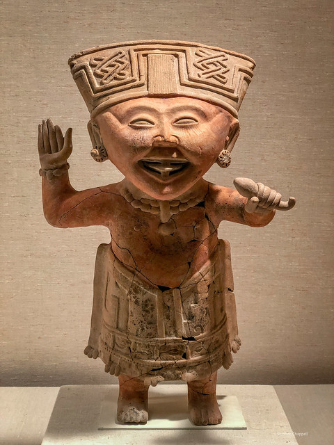 Mesoamerican smiling figure