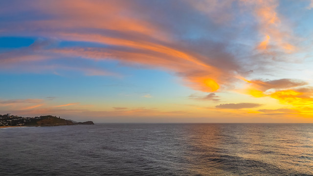 Sunrise Seascape with Lenticular cloud