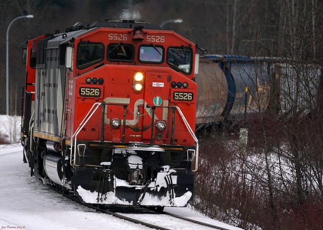 CN 5526 (assisted by 2635) leads a grain & coal train west toward Prince Rupert over the Skeena Sub (BC North Main) @ Kitsumkalum, 3 miles west of Terrace, BC - 9 January 2015 [© WCK-JST]
